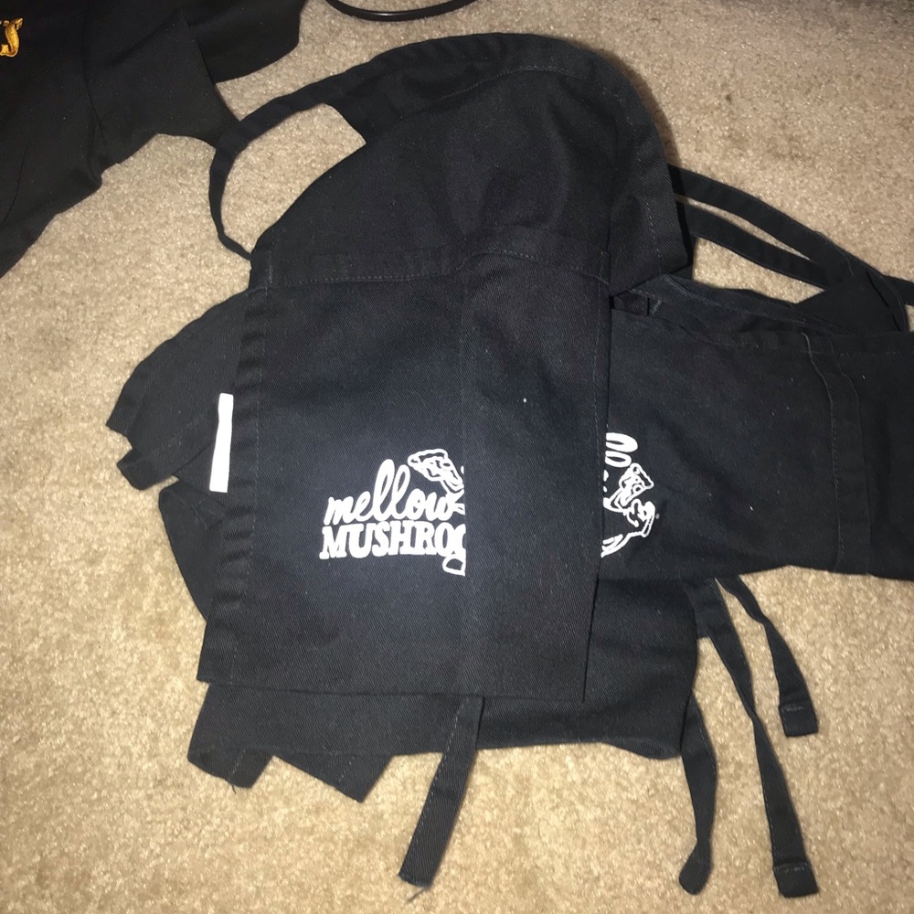 Mellow mushroom aprons (3)